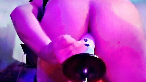Trans woman gapes anus with thick blue dildo on fucking machine