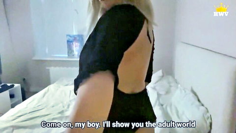 Blonde MILF in black lace lingerie teases her big ass from behind saying 'Come on my boy I'll show you the adult world'
