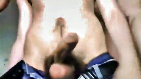 Italian man wanking his erect cock in pulled-down blue shorts, amateur solo