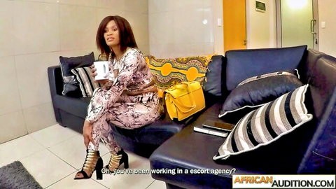 Ebony mom in colorful jumpsuit confessing escort work during casting audition