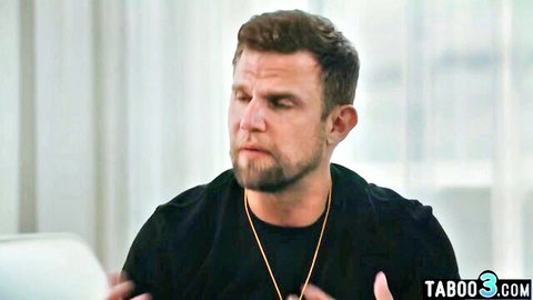 Muscular white perv coach with beard in black shirt, intense gaze