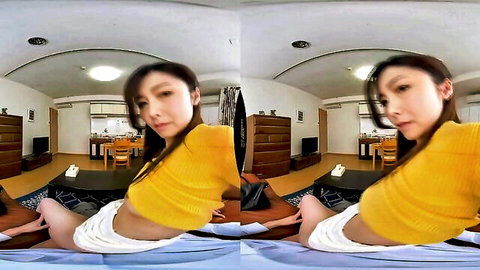 Sexy Japanese housewife in yellow sweater and white shorts spreads legs teasing on bed POV