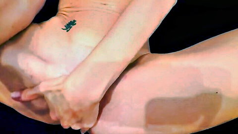 Closeup of skinny woman's shaved pussy being deeply fingered by manicured hand tattoo on hip