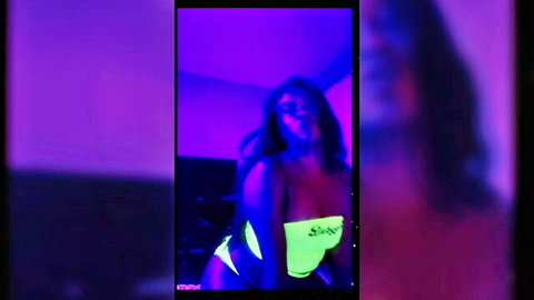 Latina amateur in slutty neon green thong shows juicy big ass doggy style under purple lights