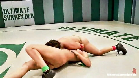 Penny and Izamar in nude erotic wrestling submission hold