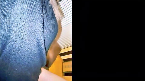 Hand groping massive tits under tight blue sweater in teasing grope