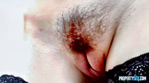 Close-up of skinny blonde Cosima Knight's hairy pussy in black lace lingerie