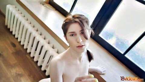 Hot Pearl nude teen posing eagerly by window, slim body exposed