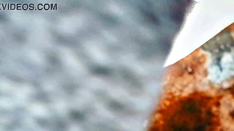 Amateur footage of a girl bathing, wet skin close-up