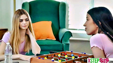 Molly Little and Alex Coal in pink tops at foosball table, stepsister fantasy setup