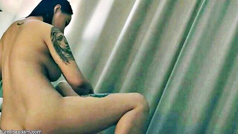 Lee Chae Dam nude from behind, tattooed Asian beauty spreading legs in steamy lesbian tease