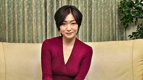 Ryu Enami in form-fitting maroon V-neck sweater, smiling seductively