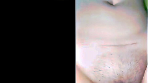 Close-up of nude woman's lower abdomen with scar and pubic hair