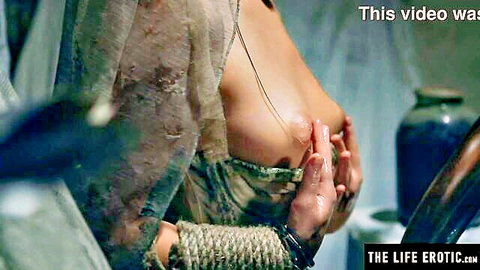 Kinky abandoned bride in sheer veil and ropes, topless, teasing breasts in erotic solo scene