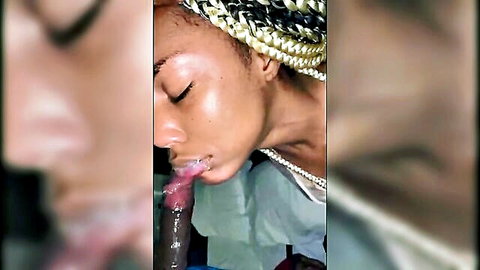 Ebony woman with blonde braids deepthroating dildo with wet mouth