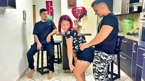 Redhead in shorts bends over as man grinds on her ass at party, boyfriend watches NTR