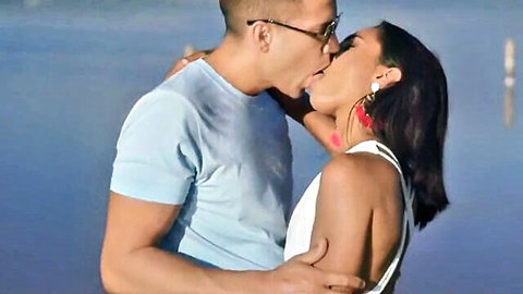 Busty teen model passionately kissing lover outdoors by water