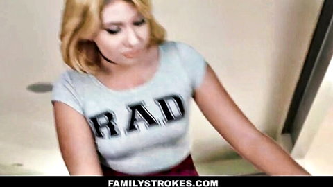 Blonde stepsis Zelda Morrison in RAD t-shirt and red skirt tease