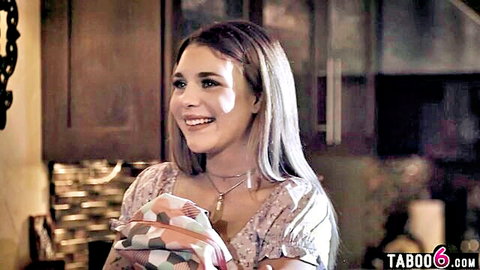 Gabbie Carter as busty blonde teen babysitter smiling with baby blanket