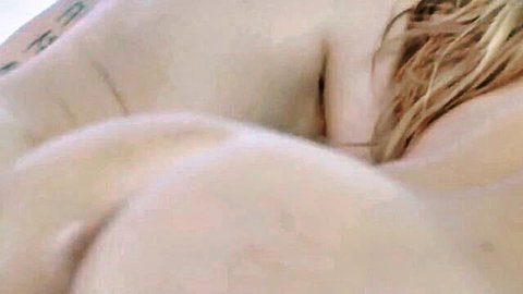 Carter Cruise nude from behind, curvaceous ass and blonde hair, with Riley Reid in threesome