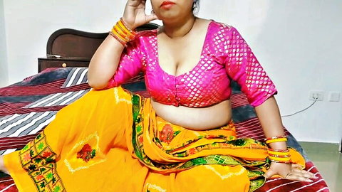 Jauli Chaupada as curvy Desi bhabhi in pink blouse and yellow saree, teasing seductively