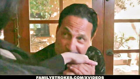 MILF in black top covering man's mouth in intense FamilyStrokes Halloween scene