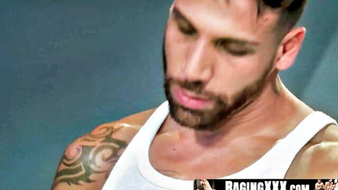 Muscular white stud with beard and tattoos in tank top, from ebony jock hookup video