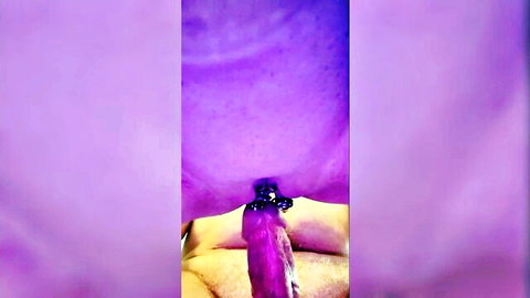 Mature cougar's plump pussy close-up farting with toy from below