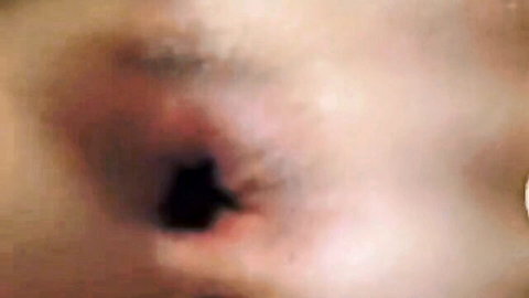 Closeup of white teen's pink gaping anus with sparse pubic hair