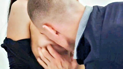 Mia Trejsi in passionate neck kiss embrace with partner, brunette charm