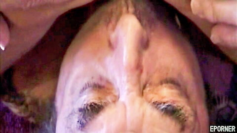 Mature blonde deepthroating cock POV with wide open mouth and eyes closed in ecstasy