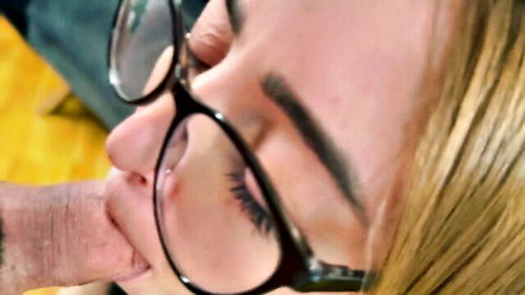 Blonde girl in glasses sucks thick man's fingers closeup POV