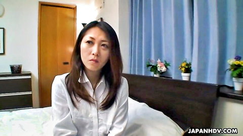 Noriko Sudo, naughty Japanese wife in white blouse on bed