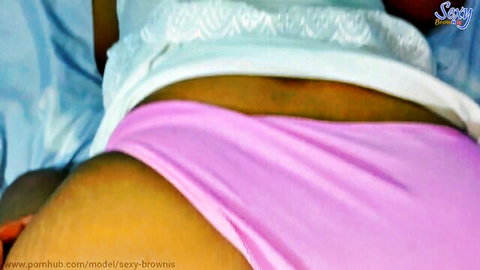 Sexy Brownis in pink panties and white top, teasing curvy ebony ass on bed