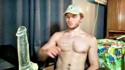 Fit freckled redhead hunk holds massive clear dildo teasing on webcam