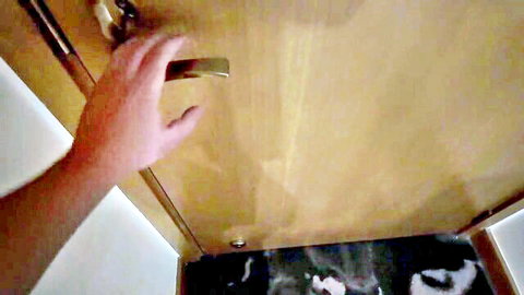 Stepson's hand turns doorknob entering hotel room with sexy stepmom