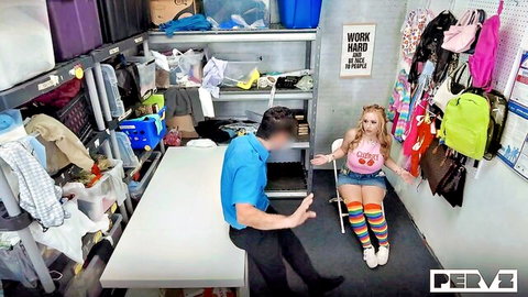Blonde babe in tiny denim shorts spreads legs teasing employee in cluttered stockroom