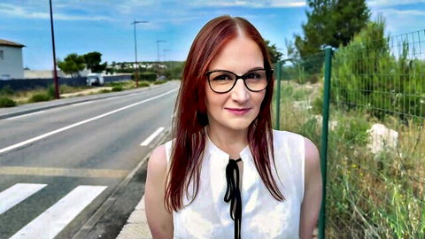 Lavyana, 29yo redhead salesperson in white blouse and glasses outdoors