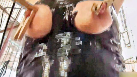 Curvy hairy MILF teasing with clamps on big ass from behind
