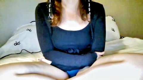 Sienna Doll petite redhead in black top and blue panties, legs spread tease