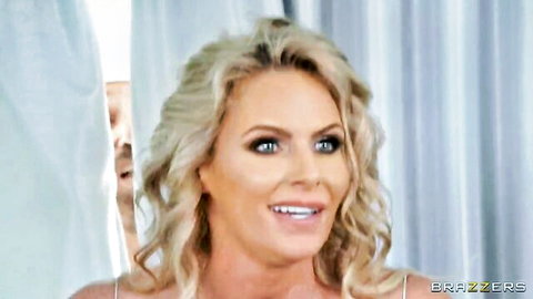 Phoenix Marie blonde MILF smiling in white lingerie for Brazzers