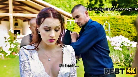 Distressed redhead bride in white dress grabbed by bald gangster outdoors