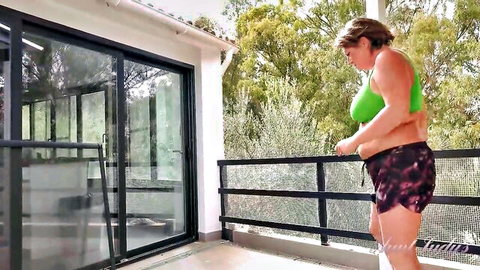 43yo busty amateur JoJo works out on terrace in green sports bra