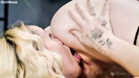 Blonde MILF passionately French kissing bearded stud groping her exposed big tits