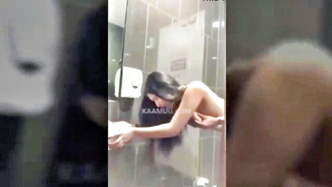 Desi couple in intense doggystyle bathroom sex, long-haired woman bent over