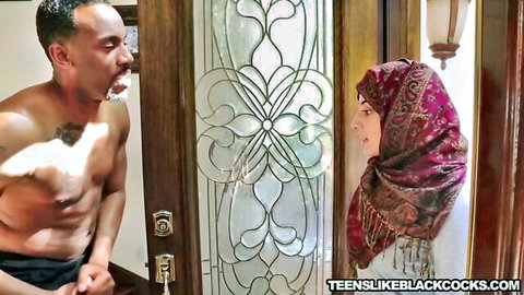 Nadia Ali in hijab seduced by muscular black man at door BBC tease