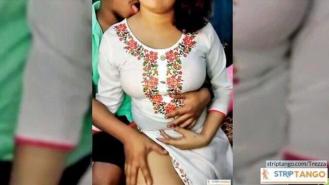 Curvy Indian woman in embroidered white dress embraced intimately in amateur live chat