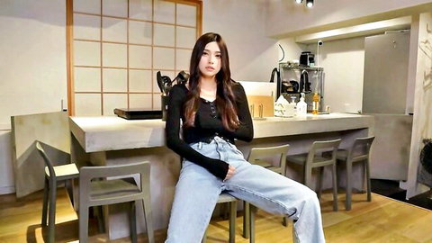 Jewelz Blu in black top and jeans, seductive kitchen pose