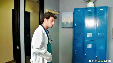 Brazzers doctor in white coat, curly hair male model in medical scene preview