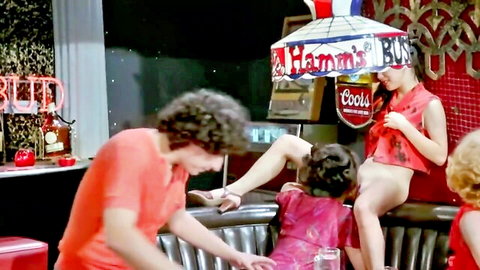 Vintage retro babe exposes shaved pussy on bar stool as curly-haired man gropes her amid sexy women